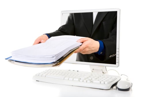 Practice Management Software - Hands with File Folders in Computer Screen